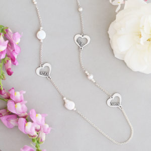 A Silver Necklace with Pearls and a Personalised Hearts