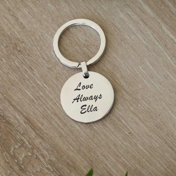 A round stainless steel keyring