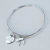 Silver expandable bangle with Heart and Chai charms