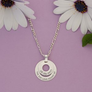 A silver two layer charm
