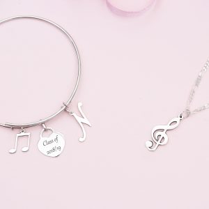 Silver expandable bangle with charms