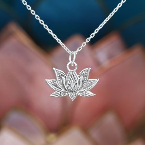 A silver lotus flower charm.