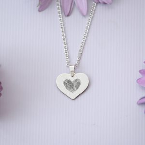 Pretty heart charm with finger print heart